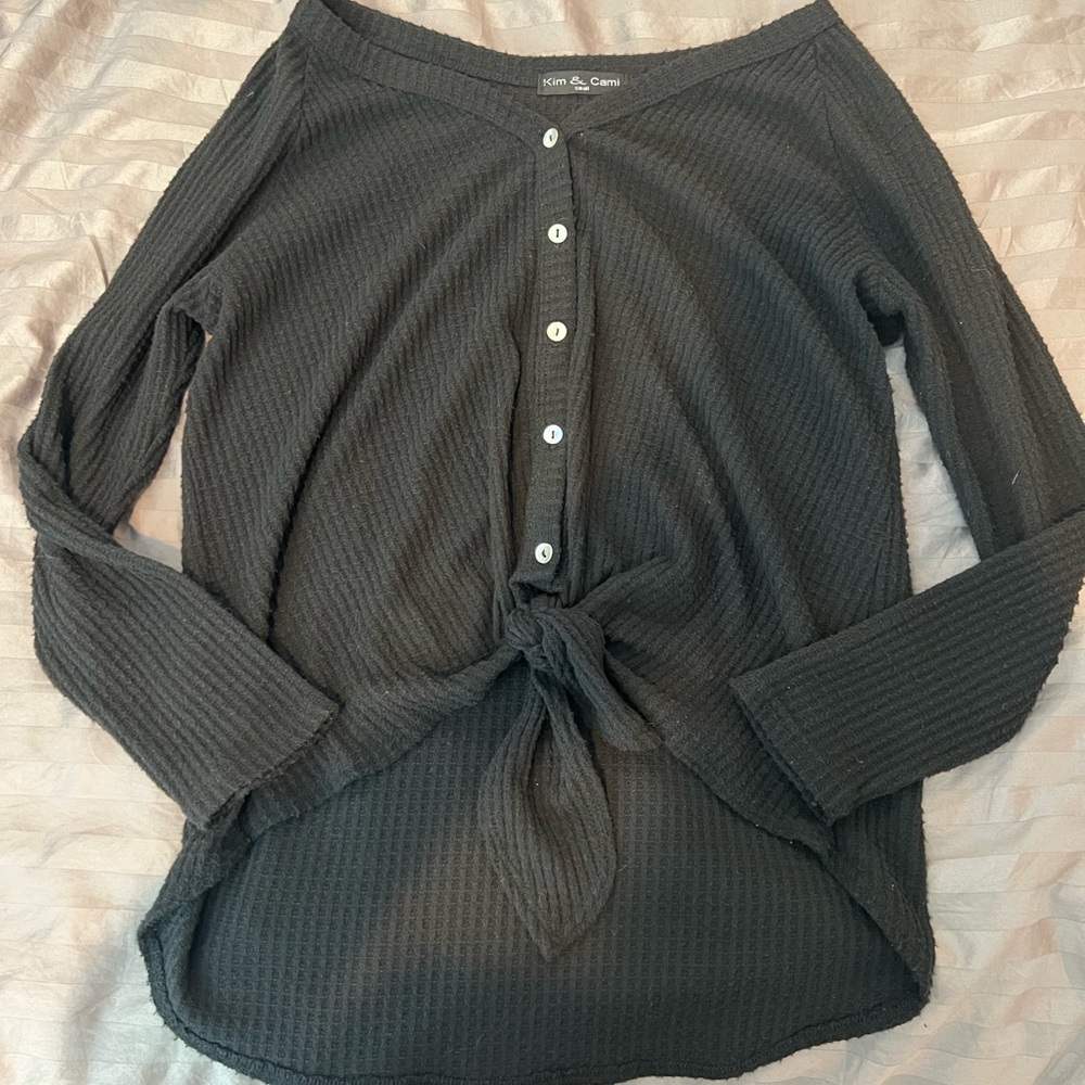 Black long sleeve sweater.